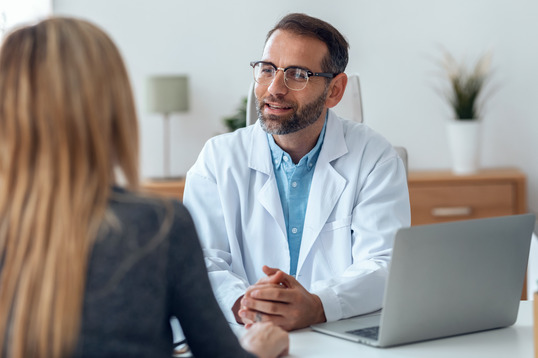 doctor talking to patient 